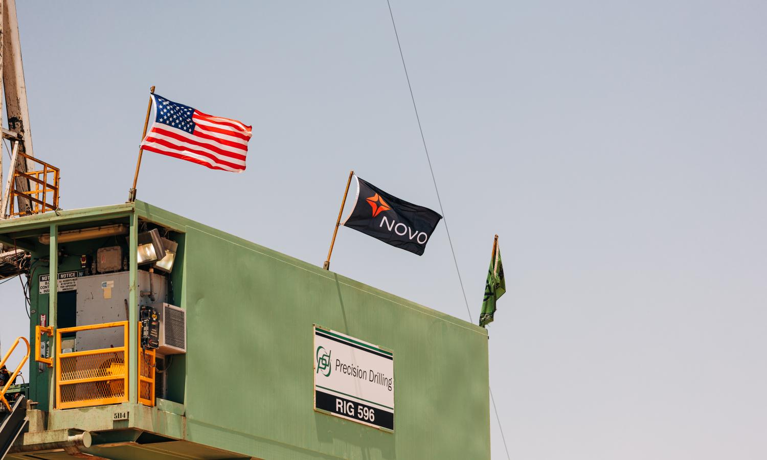 Novo flag blowing in the wind during drilling