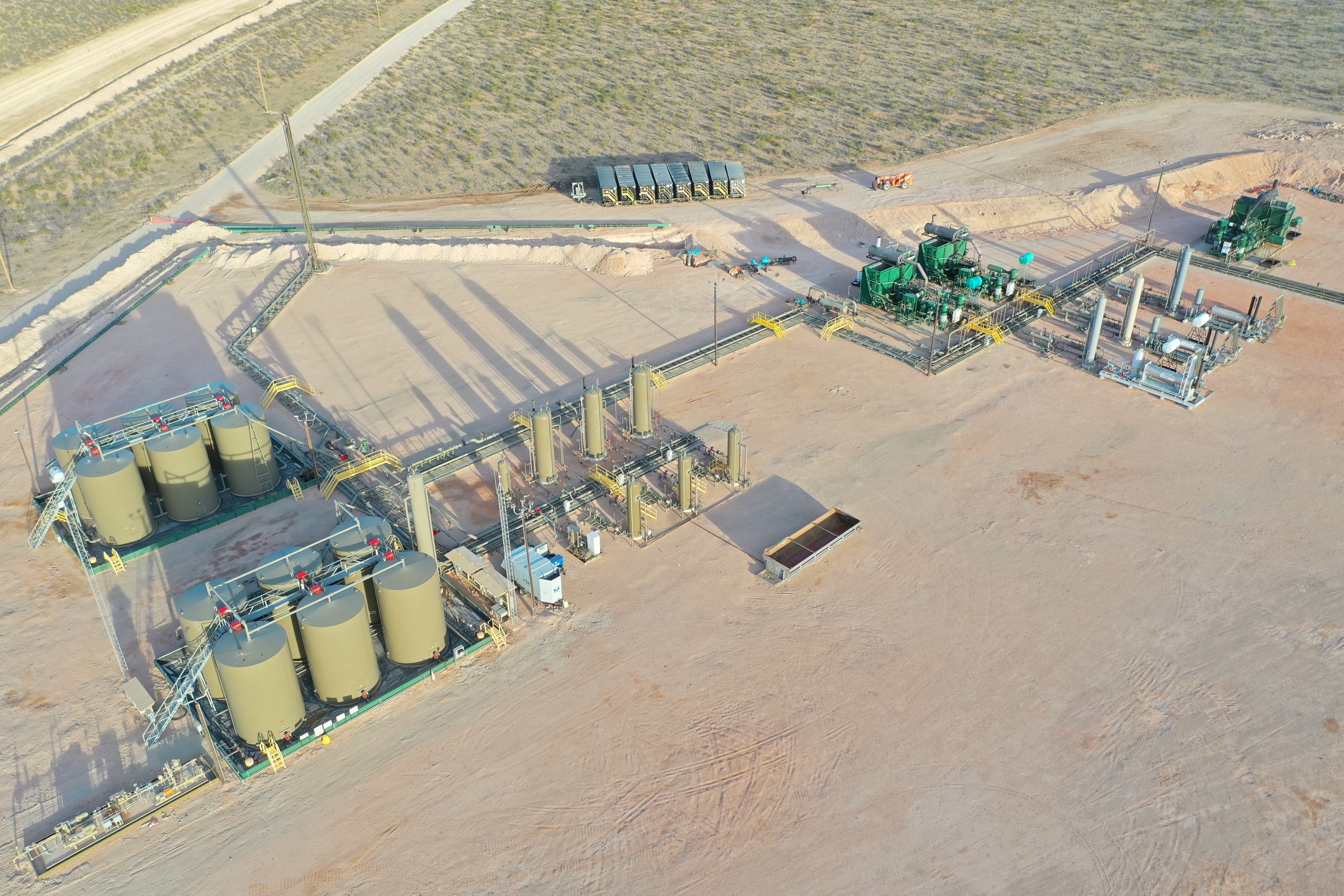 Central tank battery with centralized gas sales compression