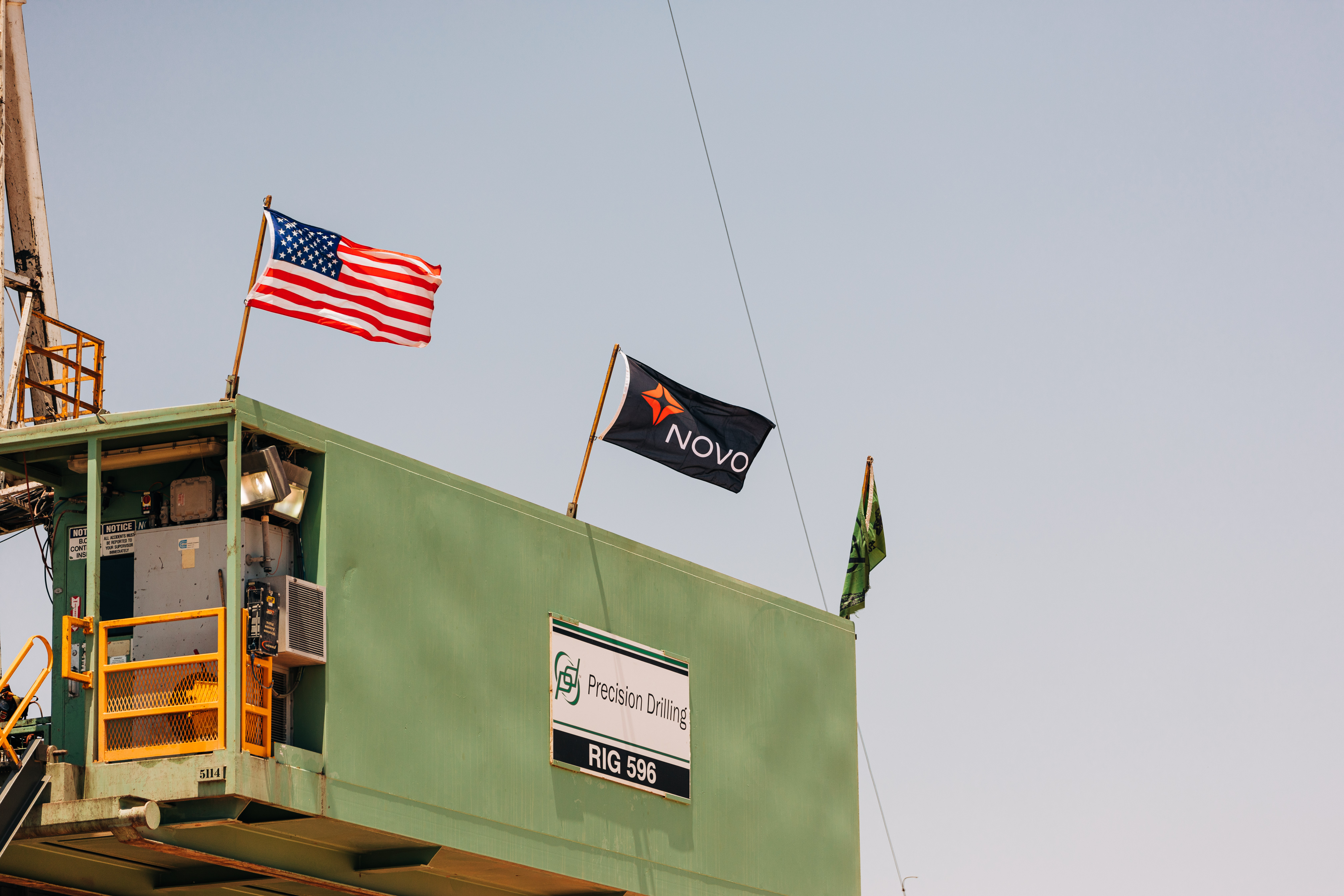 Novo flag blowing in the wind during drilling